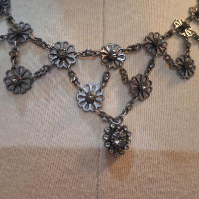 Sale Photo Thumbnail #436: Dainty black choker necklace.