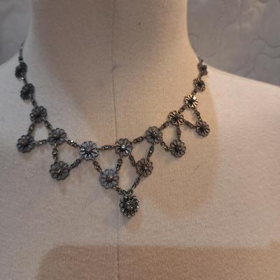 Sale Photo Thumbnail #438: Dainty black choker necklace.
