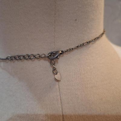 Sale Photo Thumbnail #440: Dainty black choker necklace.