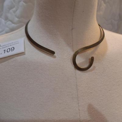 Sale Photo Thumbnail #483: Simple Modern Chocker v swirl, brass colored.