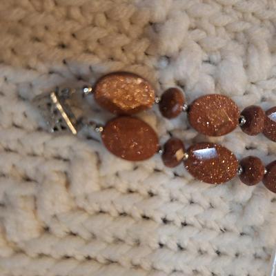 Sale Photo Thumbnail #507: 2 strand brown stone bracelet