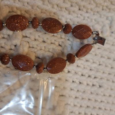 Sale Photo Thumbnail #509: 2 strand brown stone bracelet