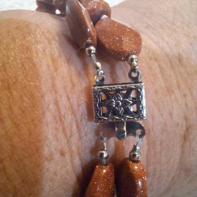 Sale Photo Thumbnail #510: 2 strand brown stone bracelet