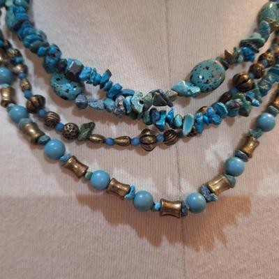 Sale Photo Thumbnail #517: Multi strand rock chip necklace with turquoise color rocks and silver tone beads