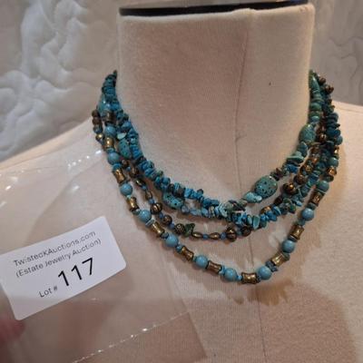 Sale Photo Thumbnail #516: Multi strand rock chip necklace with turquoise color rocks and silver tone beads
