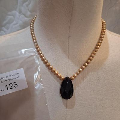 Sale Photo Thumbnail #551: Pearl necklace with black tear drop pendant -sterling silver clasp marked 925