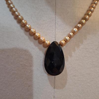 Sale Photo Thumbnail #552: Pearl necklace with black tear drop pendant -sterling silver clasp marked 925