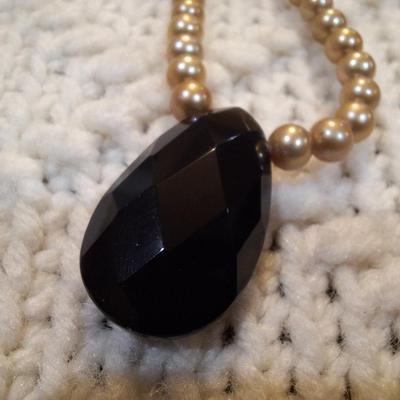 Sale Photo Thumbnail #554: Pearl necklace with black tear drop pendant -sterling silver clasp marked 925
