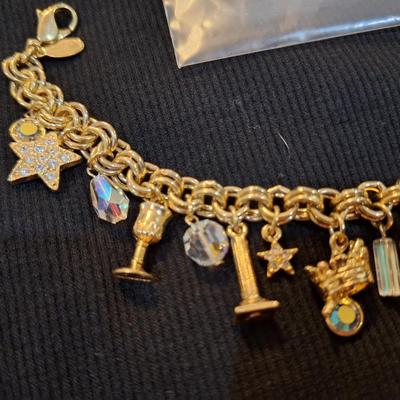 Sale Photo Thumbnail #583: Kirks folly gold tone charm bracelet