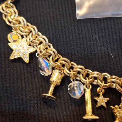 Sale Photo Thumbnail #587: Kirks folly gold tone charm bracelet