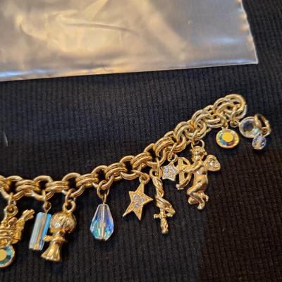 Sale Photo Thumbnail #584: Kirks folly gold tone charm bracelet