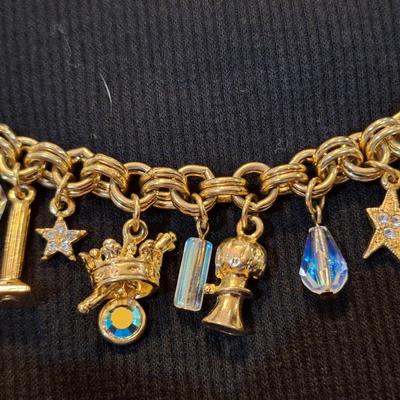 Sale Photo Thumbnail #586: Kirks folly gold tone charm bracelet
