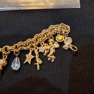 Sale Photo Thumbnail #585: Kirks folly gold tone charm bracelet