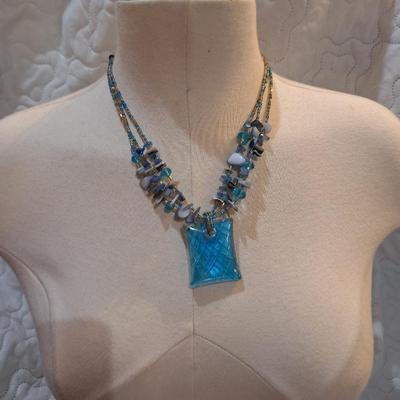 Sale Photo Thumbnail #600: Rock chip necklace with large rectangular blue pendant