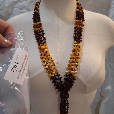 Sale Photo Thumbnail #634: multi strand necklace with beige and brown beads