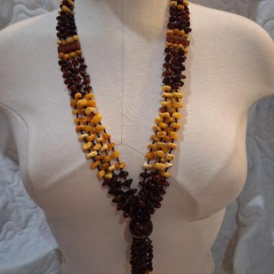 Sale Photo Thumbnail #635: multi strand necklace with beige and brown beads