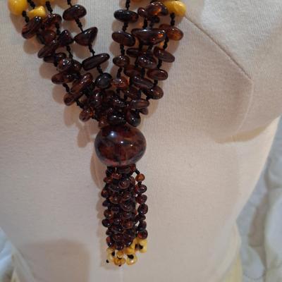 Sale Photo Thumbnail #633: multi strand necklace with beige and brown beads