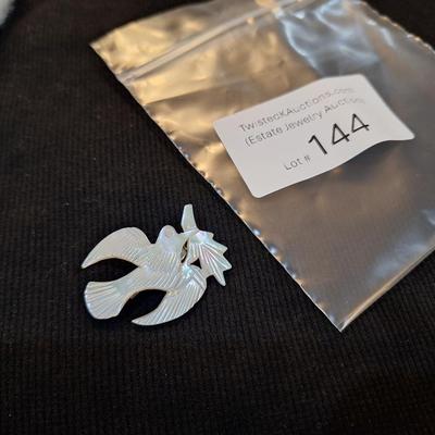 Sale Photo Thumbnail #643: carved mother of pearl swallow brooch