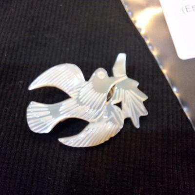 Sale Photo Thumbnail #640: carved mother of pearl swallow brooch