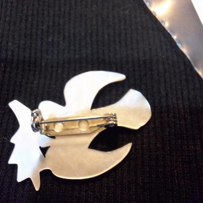 Sale Photo Thumbnail #642: carved mother of pearl swallow brooch