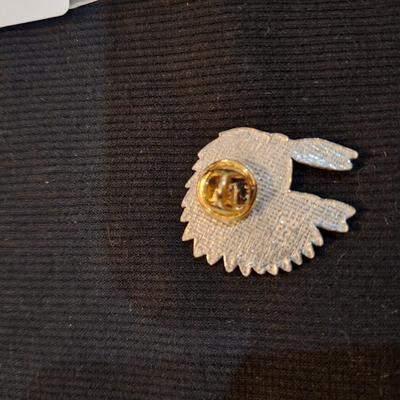 Sale Photo Thumbnail #688: lapel pin of chief headdress labeled Oklahoma