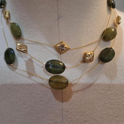 Sale Photo Thumbnail #693: multistrand necklace with green beads, gold tones
