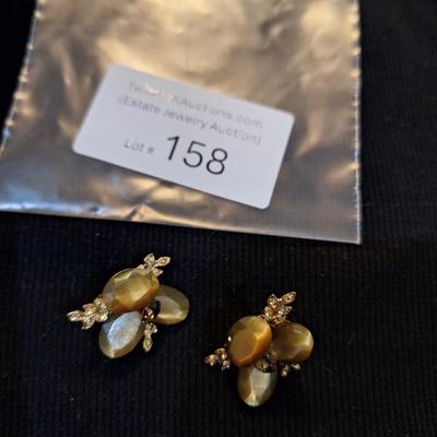 Sale Photo Thumbnail #701: vintage topaz colored earrings no backs.