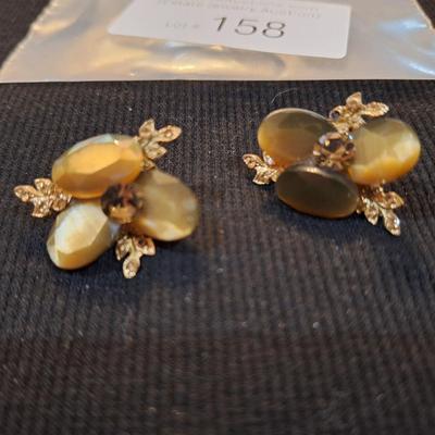 Sale Photo Thumbnail #704: vintage topaz colored earrings no backs.