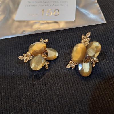 Sale Photo Thumbnail #702: vintage topaz colored earrings no backs.