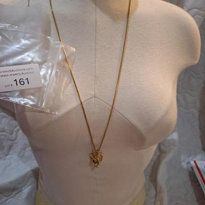 Sale Photo Thumbnail #715: long gold tone necklace with pendant