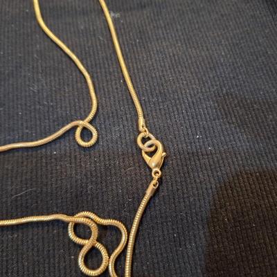Sale Photo Thumbnail #720: long gold tone necklace with pendant