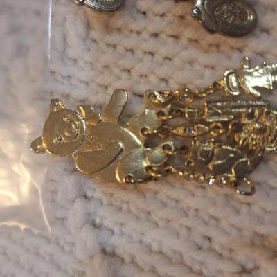 Sale Photo Thumbnail #758: lapel pins or brooches, bears and motorcycles