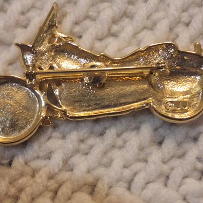 Sale Photo Thumbnail #765: motorcycle brooch- gold tone, signed "jj"