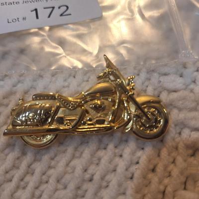 Sale Photo Thumbnail #763: motorcycle brooch- gold tone, signed "jj"