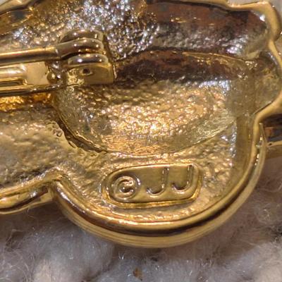 Sale Photo Thumbnail #766: motorcycle brooch- gold tone, signed "jj"