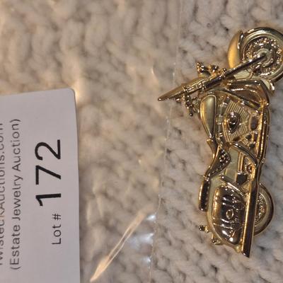 Sale Photo Thumbnail #768: motorcycle brooch- gold tone, signed "jj"