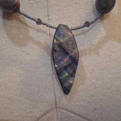 Sale Photo Thumbnail #770: Necklace with Abalone looking pendant