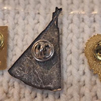 Sale Photo Thumbnail #781: lapel pins, native head dress, teepee and flower
