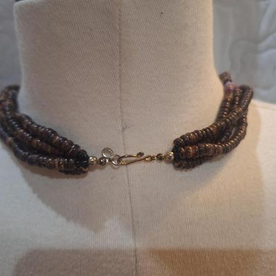 Sale Photo Thumbnail #787: large statement necklace with geometric pendant and dangles.