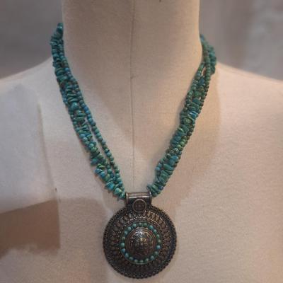 Sale Photo Thumbnail #811: Rock chip necklace with large round pendant