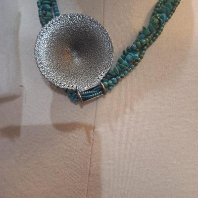 Sale Photo Thumbnail #813: Rock chip necklace with large round pendant