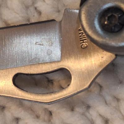 Sale Photo Thumbnail #839: 2 pocket knives- one is USA