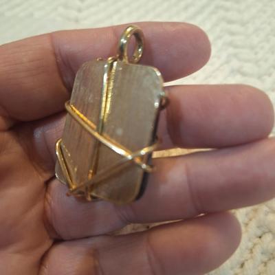 Sale Photo Thumbnail #847: leopard print square pendant with gold tine wires