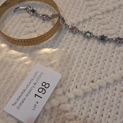 Sale Photo Thumbnail #892: 2 bracelets, silver tone bears and gold tone cuff