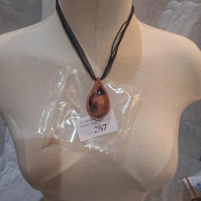 Sale Photo Thumbnail #1142: glass pendant on ribbon necklace