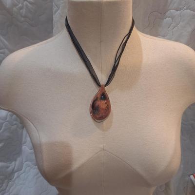 Sale Photo Thumbnail #1141: glass pendant on ribbon necklace