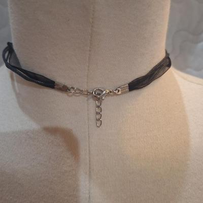 Sale Photo Thumbnail #1143: glass pendant on ribbon necklace