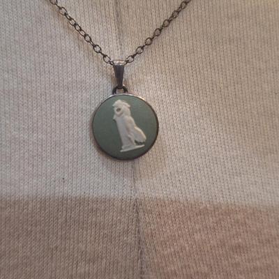 Sale Photo Thumbnail #1245: small round cameo pendant on short necklace