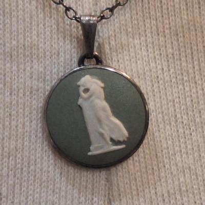 Sale Photo Thumbnail #1243: small round cameo pendant on short necklace