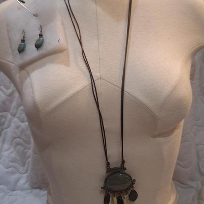 Sale Photo Thumbnail #1253: Long necklace with oval rock pendant and matching earrings